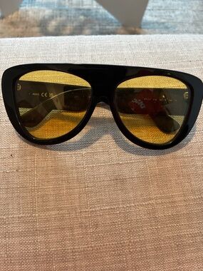 Emilio Pucci Black Frame Sunglasses with Yellow Lenses